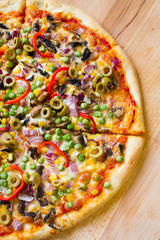 delicious vegetarian pizza on wood