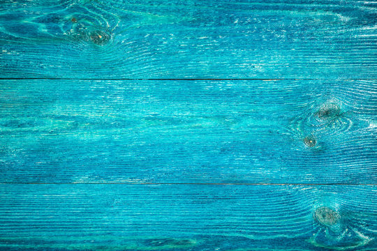 Blue wood background. Board closeup.