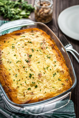 Shepherd's pie on a wooden background