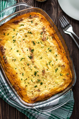 Shepherd's pie on a wooden background