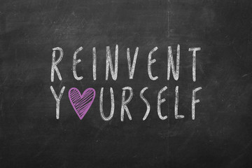 Obraz premium Hand written Reinvent Yourself