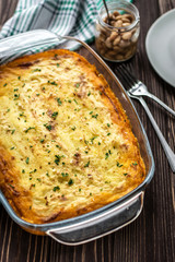 Shepherd's pie on a wooden background