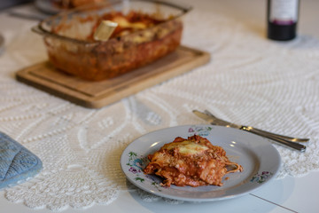 Tasty lasagna prepared in the oven in the home kitchen. A tasty meal cooked in the oven.