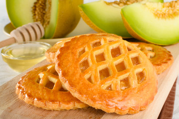 Melon cookies with honey. Fresh baked cookies filled with tasty homemade stuffing of melon.