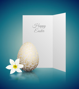 White color realistic egg with golden metallic floral pattern and Happy Easter card. White narcissus flower on turquoise background with reflection. Vintage banner, card, poster. Simple design