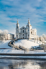 Fototapeta na wymiar Uspensky Cathedral is a temple in Vitebsk, historical architecture on a clear sunny day in the winter