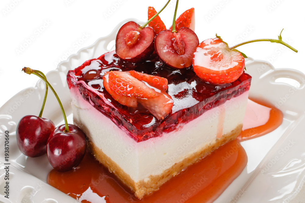 Wall mural Delicious cheesecake with berries,fresh strawberry and cherry cheesecake on table.