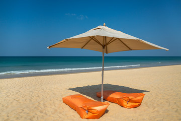 Sunbeds on Hat Na Tai (Natai) beach
