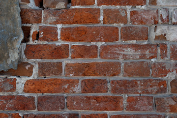 Red old brick wall, background, texture, close-up.