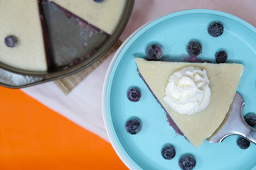 Whipped cream topped dessert recipe, shows jello like pie as food.