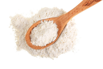 Pile of flour in wooden spoon isolated on white background. Top view. Flat lay