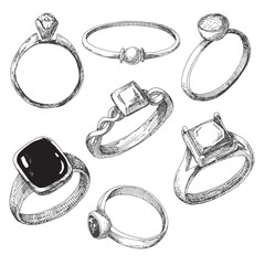 Hand drawn a set of different jewelry rings. Vector illustration of a sketch style. - 193875629