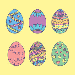 Vector set of doodle Easter eggs. Color hand drawn Easter eggs on yellow background