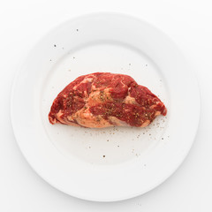 fresh beef meat on white plate