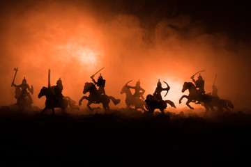 Medieval battle scene with cavalry and infantry. Silhouettes of figures as separate objects, fight...