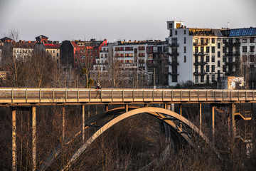 railway tracks and abridge during sunset