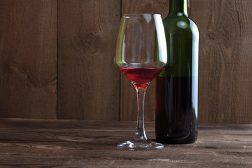 Glass and bottle of red wine