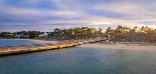 Fototapeta premium Tropical bridge at sunset