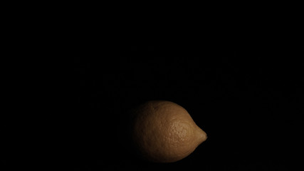 Lemon, black background.