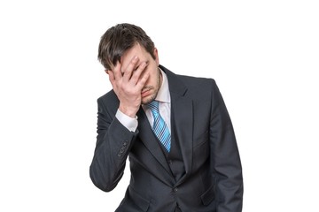 Disappointed and sad man isolated on white background.