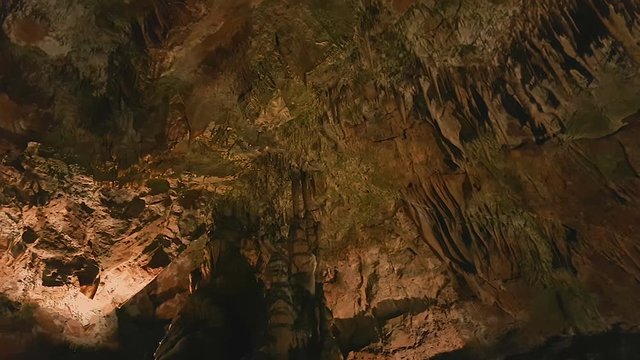 Pan to the rght of ancient rock formations on the ceiling of Saeva Cave, Bulgaria