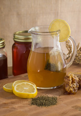 Hot teach with lemon and honey - fresh raw honey comb for healthy living and to calm cough and sore throat