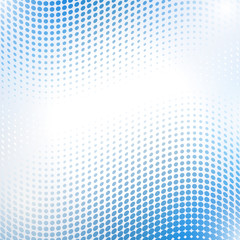 Abstract halftone wave in blue