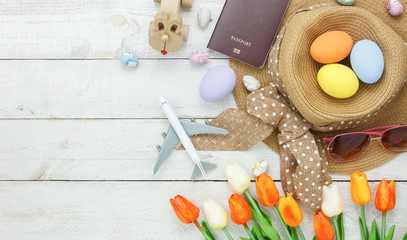 Table top view shot of decoration Happy Easter holiday background with accessory woman to travel...