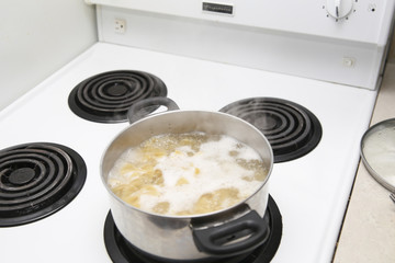 cooking pasta in the pan, boiled water