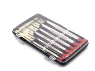Small screwdriver to repair on white background