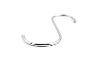 S-shape metal hook isolated on white background.