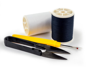 White thread with metal scissor