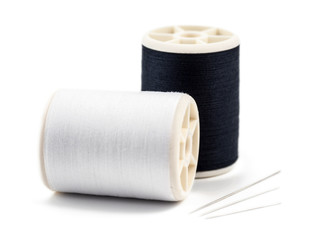 Black & White spools of thread for sewing and embroidery.