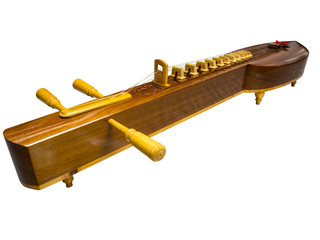 Thai traditional music instrument called zither  isolated on white background including clipping path.