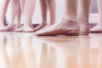 Dancers in Jazz shoes standing in the studio classroom