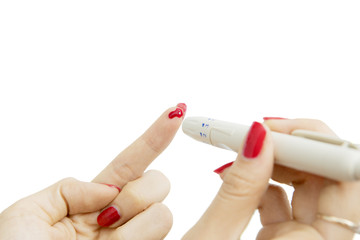 Anonymous woman using a lancet pen