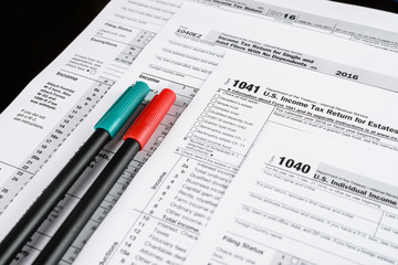 Obraz premium Form 1040 Individual Income Tax return form. United States Tax forms 2016/2017. American blank tax forms. Tax time.