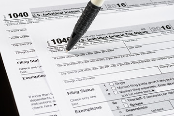 Form 1040 Individual Income Tax return form. United States Tax forms 2016/2017. American blank tax forms. Tax time.