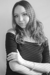 portrait of a beautiful girl with a shadow from the blinds