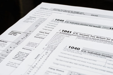 Obraz premium Form 1040 Individual Income Tax return form. United States Tax forms 2016/2017. American blank tax forms. Tax time.
