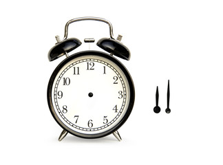 Close up of black alarm Clock analog classic vintage style with separated arrows. So you can set the time as required. Isolated on white background.