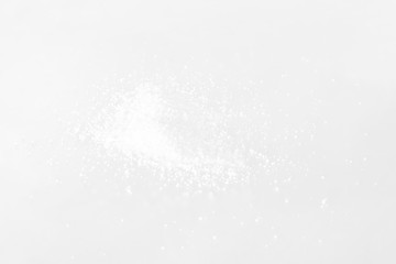 Some salt was placed on a white background.