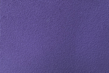 Fototapeta premium Smooth background. Texture. A small impressed uneven relief pattern. Bright light purple color.