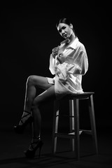 Fototapeta na wymiar feel alone quiet on wooden stool, naked legs waiting male to hold