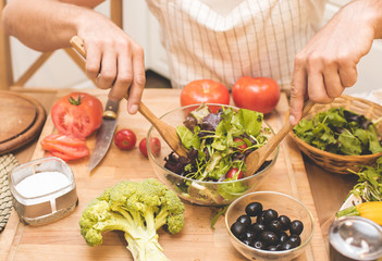 Chef man cooking in the kitchen