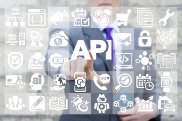 Businessman presses API text icon on a virtual interface. Application Programming Interface Business Internet Network Information Technology Computing Digital AI IOT BIG DATA Mobile concept.