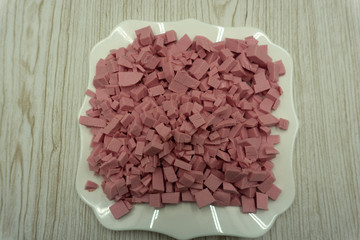 Finely chopped sausage snack soup summer thin white .