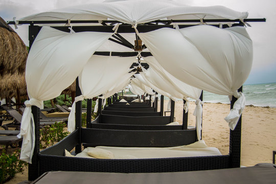 Line Up Of Beach Canopy Beds