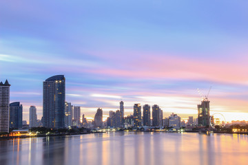 Fototapeta na wymiar Buildings cityscape Chao Phraya riverside in Bangkok Thailand