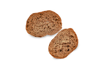 Cut slices of rye sourdough bread isolated on white background, close-up